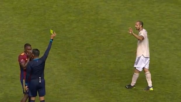 Giorgio Chiellini (right) pictured receiving the first yellow card of his MLS career during LAFC's 4-1 win at Real Salt Lake in August 2022